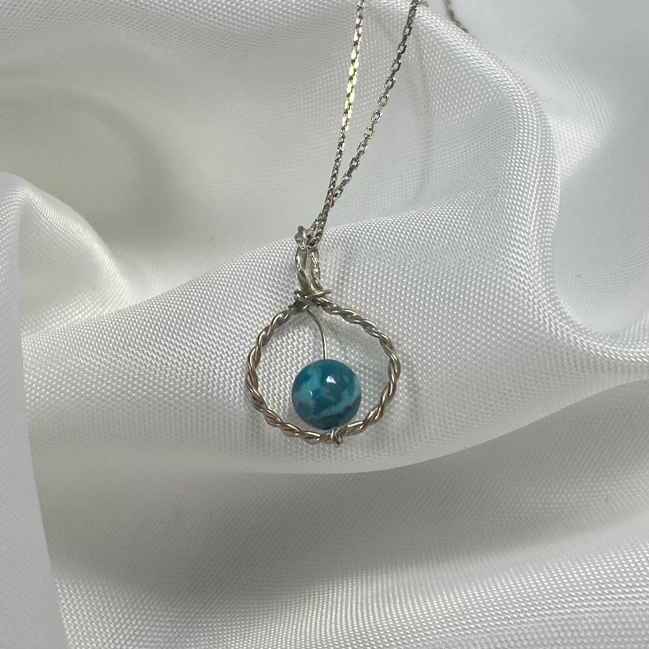 Sterling silver spiral jewelry with semi-precious stone