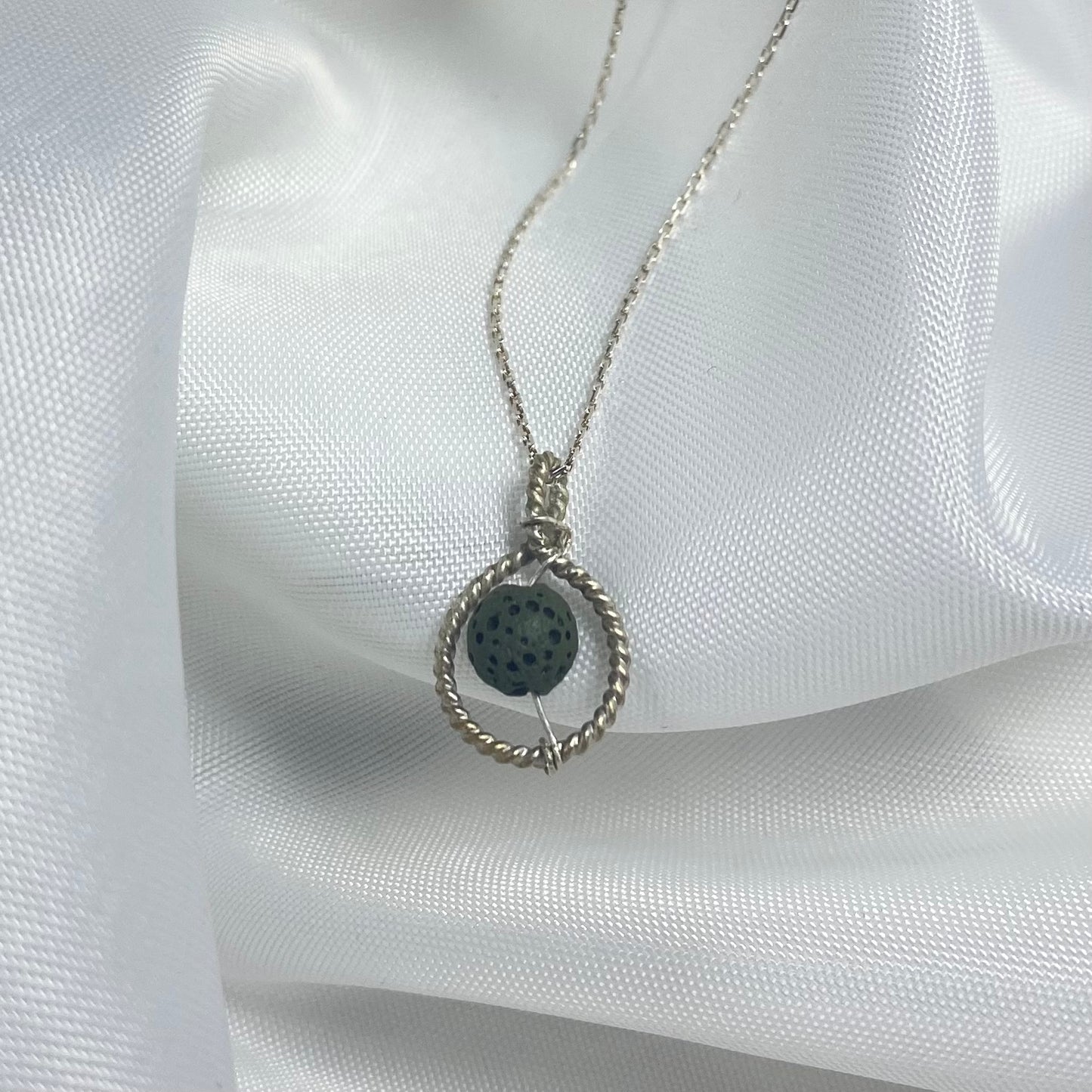 Sterling silver spiral jewelry with lava stone