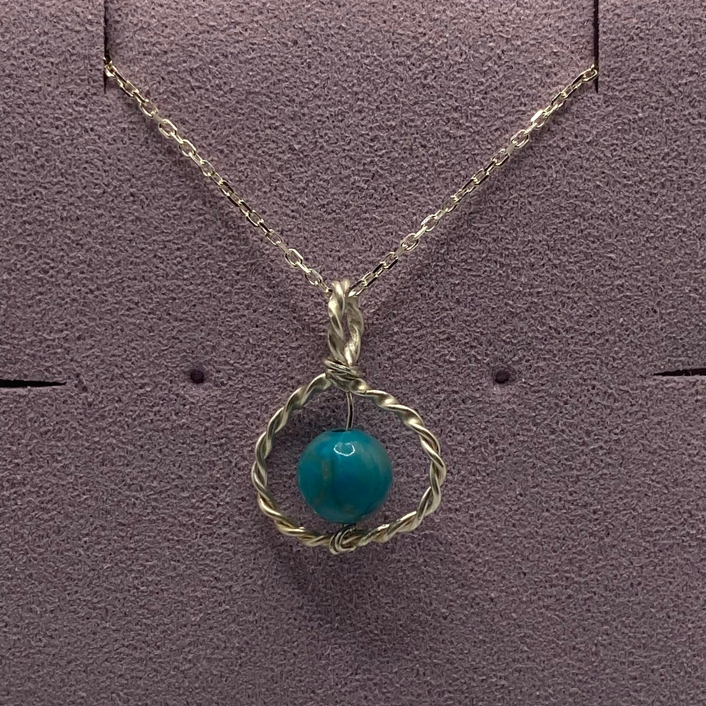 Sterling silver spiral jewelry with semi-precious stone
