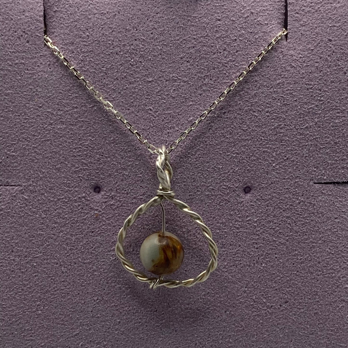 Sterling silver spiral jewelry with semi-precious stone