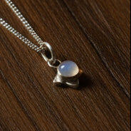 Fossil Ammonite & Engraved Wolf Sterling Silver Necklace
