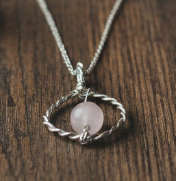 Sterling silver spiral jewelry with semi-precious stone