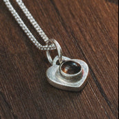 Fossil Ammonite & Engraved Wolf Sterling Silver Necklace
