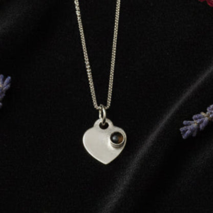 Fossil Ammonite & Engraved Wolf Sterling Silver Necklace
