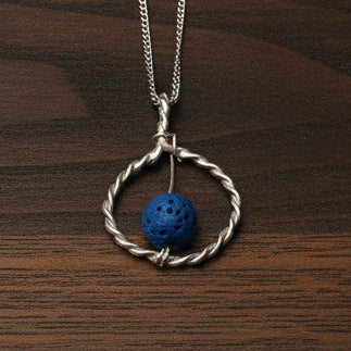 Sterling silver spiral jewelry with lava stone