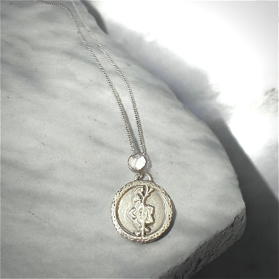 Fossil Ammonite & Engraved Wolf Sterling Silver Necklace
