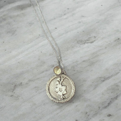 Fossil Ammonite & Engraved Wolf Sterling Silver Necklace
