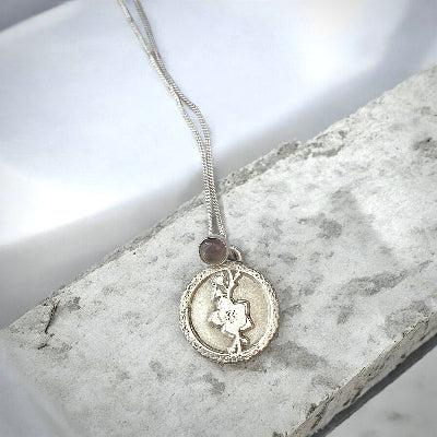 Fossil Ammonite & Engraved Wolf Sterling Silver Necklace
