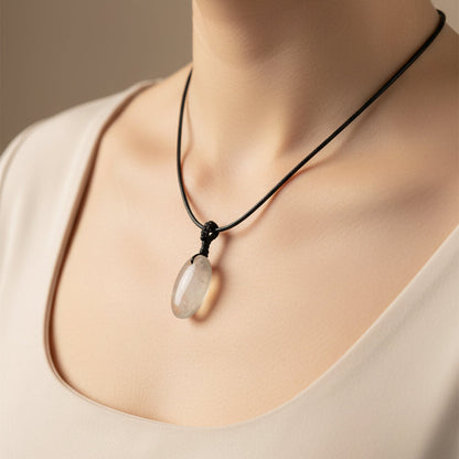 Fossil Ammonite & Engraved Wolf Sterling Silver Necklace
