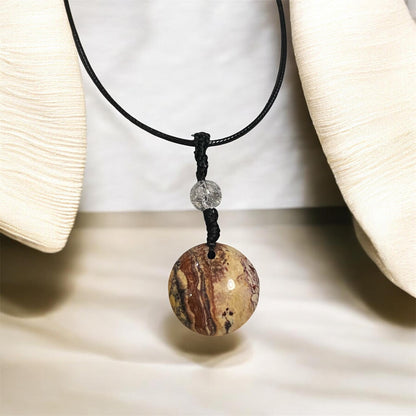 Fossil Ammonite & Engraved Wolf Sterling Silver Necklace
