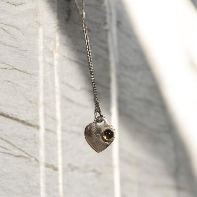 Fossil Ammonite & Engraved Wolf Sterling Silver Necklace
