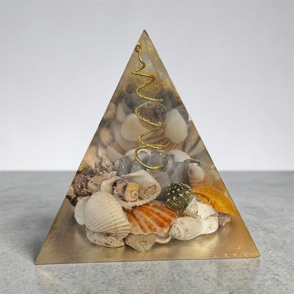 Pyramide fleur de lotus orange avec 1 pierre sphère quartz fumé et coquillages